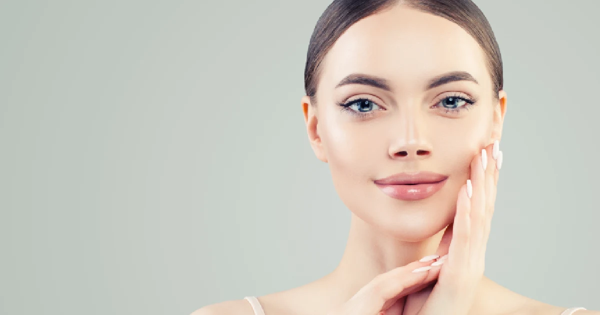 A woman with glowing skin results from facial rejuvenation in Somers, NY